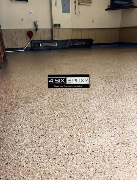 Interior space with polished speckled epoxy floor and 4 Six Epoxy branding watermark displayed on the concrete surface